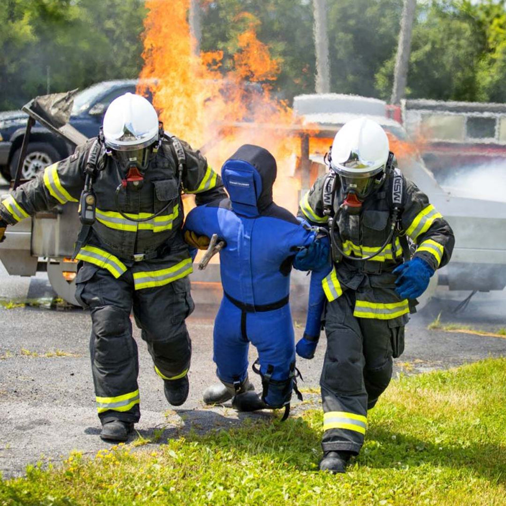 LION® SmartDummy™ Extrication being dragged by fire fighters