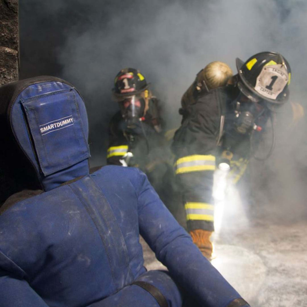 fire fighters saving a LION® SmartDummy™ Rescue